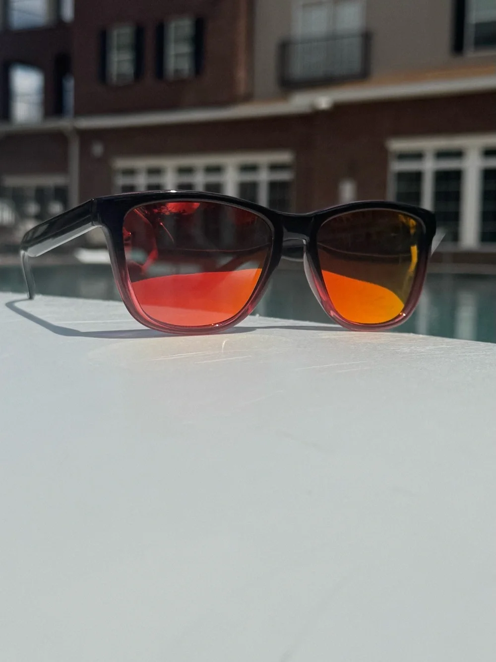 Men's Black Frame Sunglasses with Red-Orange Mirrored Lenses